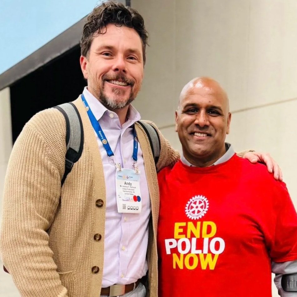 District Governor Andy Vanhook with Ramesh Ferris, polio survivor